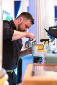 Professional Barista working at our branded event space